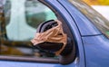 Vandalism on the wing mirror of a car Royalty Free Stock Photo