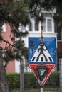 vandalized street signs, graffiti on street signs