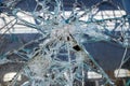 Vandals shatter glass of a window with stones