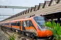 Vande Bharat Express standing at a Junction Railway Station of Indian Railways system in Howrah