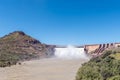 Vanderkloof Dam overflowing seen from bridge below the dam wall Royalty Free Stock Photo