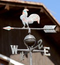 vane with a metal rooster indicating the wind direction