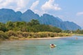 Vang Vieng, Laos - February 17, 2017: Tourists kayaking at Nam S Royalty Free Stock Photo