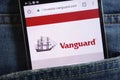 Vanguard website displayed on smartphone hidden in jeans pocket Royalty Free Stock Photo