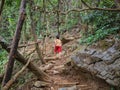 Small local guide walking and navigate to the top of Pha Ngeun in vangvieng City Laos