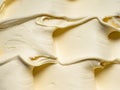 Vanila flavour gelato - full frame detail. Close up of a beige surface texture of vanilla Ice cream