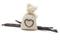 Vanilla beans and bag of aroma herbs Royalty Free Stock Photo