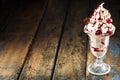 Vanilla, cherry and chocolate ice cream sundae Royalty Free Stock Photo