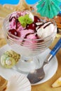 Vanilla-cherry ice cream on the beach Royalty Free Stock Photo