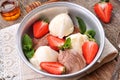 Vanilla and chocolate ice cream with organic strawberries. Rustic style. Royalty Free Stock Photo