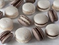 Vanilla and chocolate macaroons, on white background