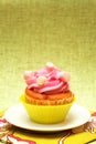 Vanilla cupcake with strawberry icing Royalty Free Stock Photo