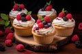 Vanilla cupcakes with cream and berries Royalty Free Stock Photo