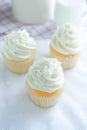 Vanilla cupcakes frosting with butter cream. Royalty Free Stock Photo