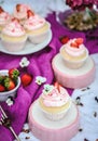 Vanilla  cupcakes with strawberry  icing Royalty Free Stock Photo