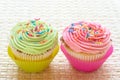 Vanilla cupcakes with strawberry and lime icing Royalty Free Stock Photo