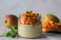 Vanilla custard topped with fresh cut mangoes served in a jar Royalty Free Stock Photo