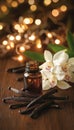 Vanilla Extract, Dried Vanilla Pods, And White Orchids On Table With Sparkling Bokeh Lights. Royalty Free Stock Photo