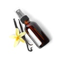Vanilla extract, flower and dry pods isolated on white Royalty Free Stock Photo