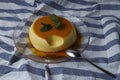 Vanilla flan served in glass dish on a kitchen cloth Royalty Free Stock Photo