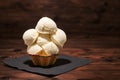 vanilla flavor scoops of ice cream in waffle cup on wooden background, dark style Royalty Free Stock Photo