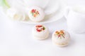Vanilla French Beautiful White Macarons on White Background Cup of Coffee Beautiful Dessert Modern Dessert