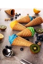 Vanilla frozen yogurt or colorful soft ice cream in waffle cone Royalty Free Stock Photo