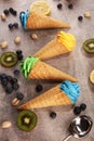 Vanilla frozen yogurt or colorful soft ice cream in waffle cone Royalty Free Stock Photo