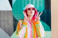 Vanilla Girl. Kawaii vibes. Candy colors design. Young woman with pink hair and sunglasses in Bucket hat and multicolor