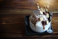 Vanilla ice cream with brownie, chocolate chip and chocolate sauce in white cup Royalty Free Stock Photo