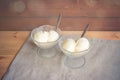 Vanilla ice cream in glass bowls with spoons Royalty Free Stock Photo