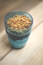 Vanilla Ice Cream Parfait with Granola Topping in Blue Tumbler