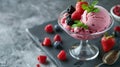 Vanilla ice cream scoops with fresh berries on the concrete dark background Royalty Free Stock Photo
