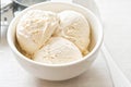 Vanilla ice cream scoops in white bowl Royalty Free Stock Photo