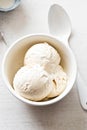 Vanilla ice cream scoops in white bowl Royalty Free Stock Photo