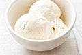 Vanilla ice cream scoops in white bowl Royalty Free Stock Photo