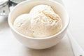 Vanilla ice cream scoops in white bowl Royalty Free Stock Photo