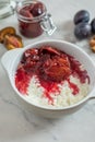 Vanilla milk rice with plum compote Royalty Free Stock Photo