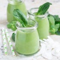 Vanilla, mint, spinach and coconut milk detox green smoothie, square format Royalty Free Stock Photo