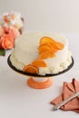 Vanilla orange cake with white frosting