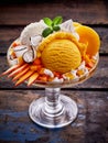 Vanilla and Peach Ice Cream Sundae with Fruit Royalty Free Stock Photo