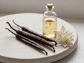 vanilla pods with vanilla essence in a bottle and vanilla flower. Royalty Free Stock Photo