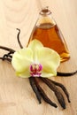 Vanilla pods, flower and bottle Royalty Free Stock Photo