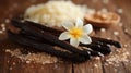 Vanilla pods, flower, and sugar on rustic wood Royalty Free Stock Photo