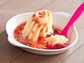 Vanilla pudding with strawberry sauce Royalty Free Stock Photo