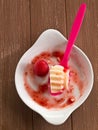 Vanilla pudding with strawberry sauce Royalty Free Stock Photo