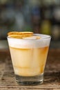 Vanilla Sour cocktail with egg white and lemon juice  on the bar Royalty Free Stock Photo