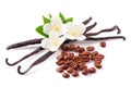 Vanilla sticks and coffee beans with flower isolated on white background Royalty Free Stock Photo