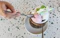 Vanilla and strawberry ice cream in a coconut shell decorated with a cute mermaid tail Royalty Free Stock Photo