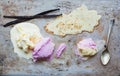 Vanilla and strawberry ice-cream scoops with vanilla sticks and